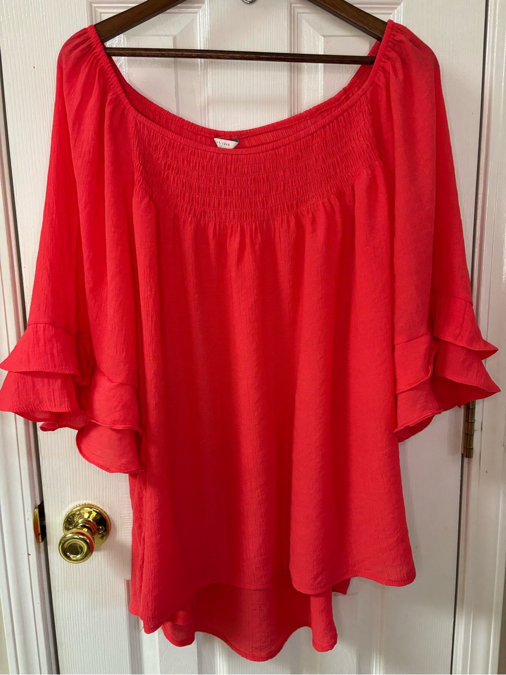 Smocked-Neck Ruffle Sleeve Tunic in Vibrant Red
